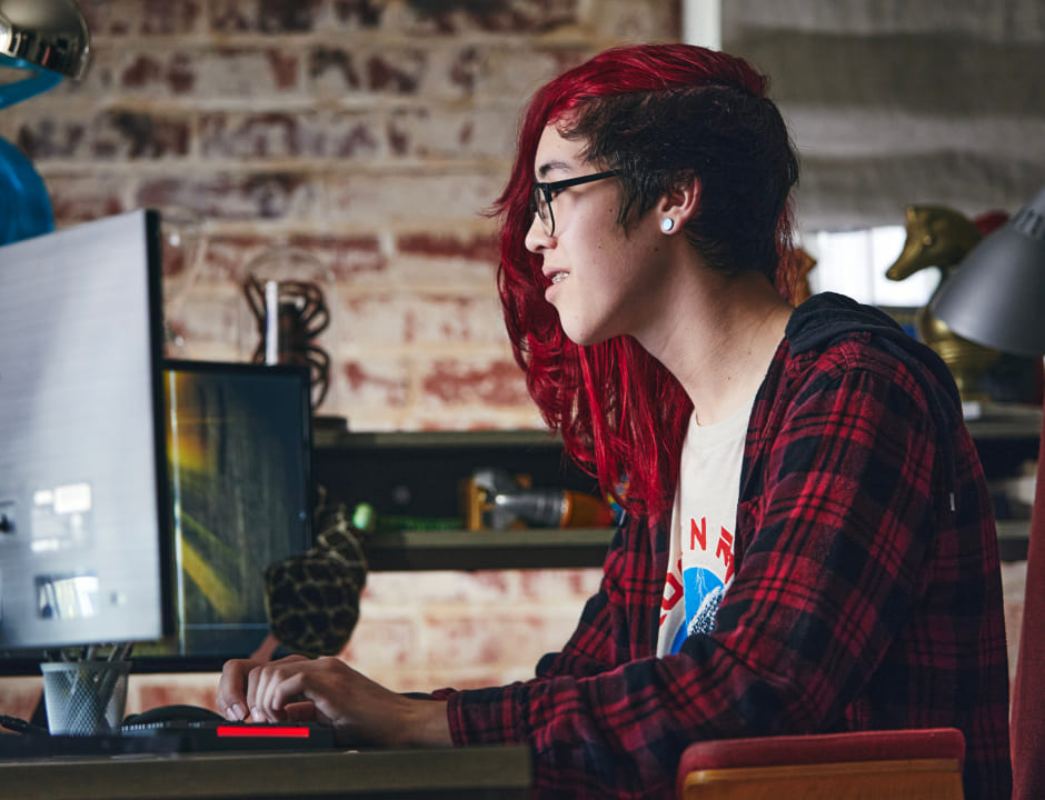 graphic student using his computer