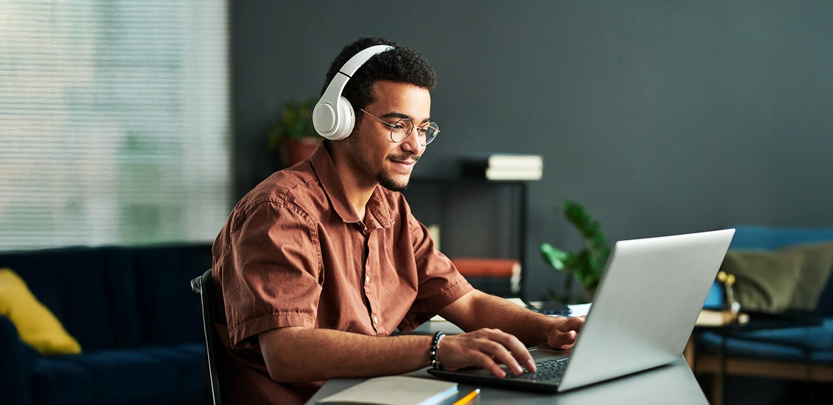 boy studying with headphones
